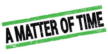 Siyah-yeşil dikdörtgen işareti üzerine yazılmış bir zaman meselesi.