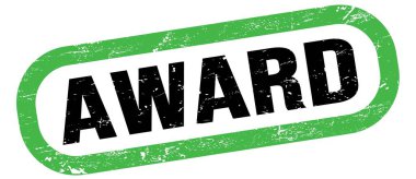 AWARD, yeşil-siyah dikdörtgen işareti üzerinde metin.