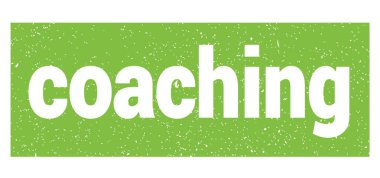 Yeşil grungy mühür işareti üzerine yazılmış koçluk metni.