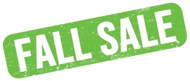 Yeşil grungy işareti üzerine yazılmış sonbahar satışı metni.
