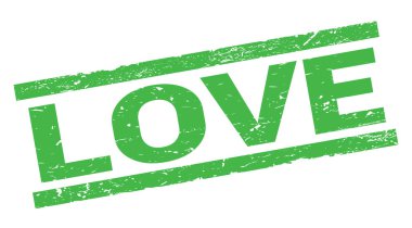 Yeşil dikdörtgen damga işareti üzerine yazılmış aşk metni.