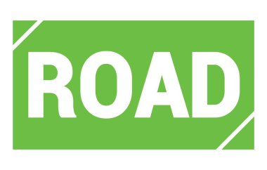 Yeşil dikdörtgen pul işareti üzerine yazılmış yol metni.