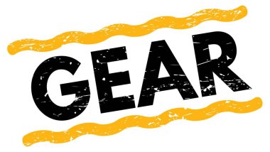 Sarı-siyah çizgi işareti üzerine yazılmış GEAR metni.