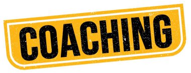 Koçluk metni sarı-siyah grungy işareti üzerine yazılmış..