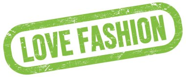 Sev FASHION, yeşil dikdörtgen mühür işareti üzerine metin.