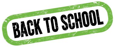 Okula Dönüş, yeşil-siyah dikdörtgen işareti üzerine metin.