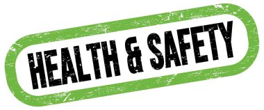 Sağlık & Güvenliği, yeşil-siyah dikdörtgen işareti üzerine metin.
