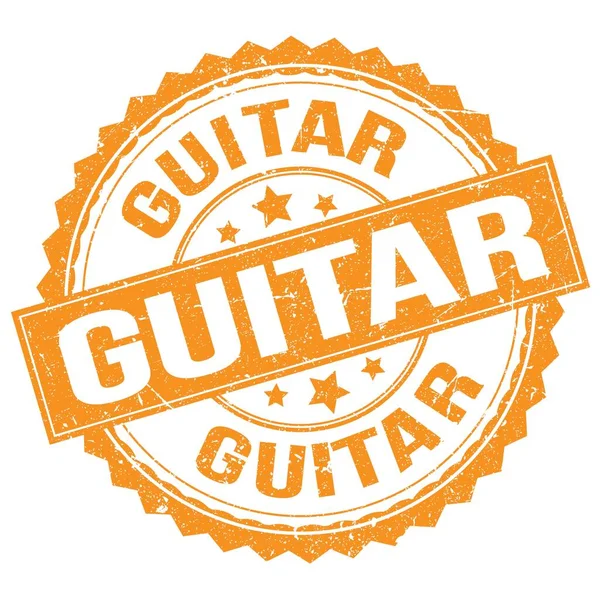 Stock image GUITAR text written on orange round stamp sign