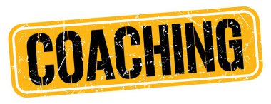 Koçluk metni turuncu-siyah pul işareti üzerine yazılmış..