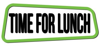 Yeşil-siyah trapez damgası üzerine yazılmış öğle yemeği metni zamanı.