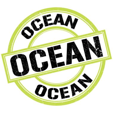 Yeşil-siyah pul işareti üzerine yazılmış OCEAN metni