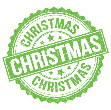 Yeşil yuvarlak pul işareti üzerine yazılmış Noel metni