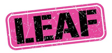 Pembe-siyah grungy işareti üzerine yazılmış yaprak metni.