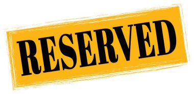 RESERVED metni turuncu-siyah dikdörtgen mühür işareti üzerine yazılmış.