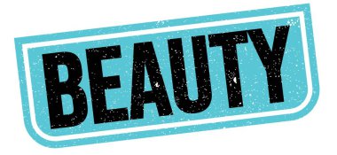 Mavi-siyah grungy işareti üzerine yazılmış Güzelim metin.