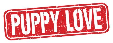 PUPPY LOVE text written on red grungy stamp sign.