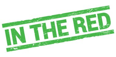 Yeşil dikdörtgen damga işareti üzerine yazılmış kırmızı metin.