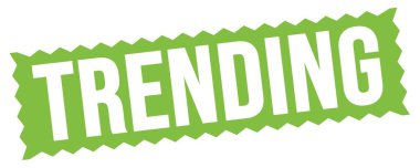 Yeşil zig-zag işareti üzerine yazılmış TRENDING metni.