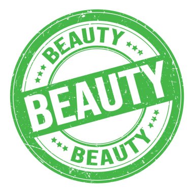 Yeşil yuvarlak grungy işareti üzerine yazılmış Güzelim metin