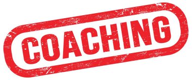 COACHING, text on red rectangle stamp sign.