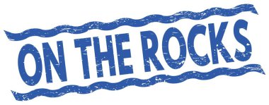 ON THE ROCKS text written on blue lines stamp sign.