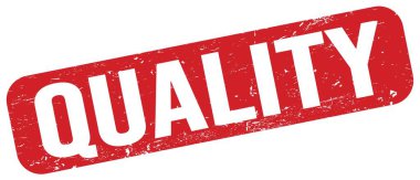 QUALITY text written on red grungy stamp sign.