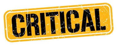 CRITICAL text written on orange-black grungy stamp sign.