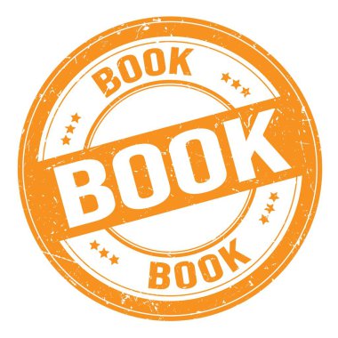 BOOK text written on orange round grungy stamp sign