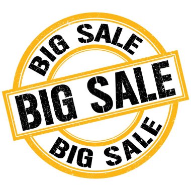 Sarı-siyah pul işareti üzerine yazılmış BIG satış metni