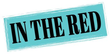 Mavi-siyah dikdörtgen işareti üzerine yazılmış kırmızı metinde.