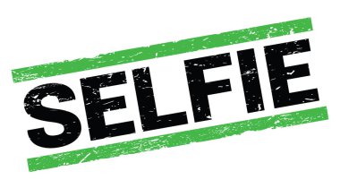 SELFIE text written on green rectangle stamp sign.