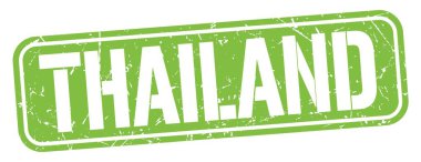 THAILAND text written on green grungy stamp sign.