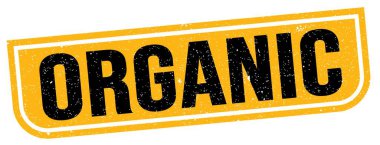ORGANIC text written on yellow-black grungy stamp sign.