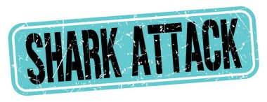 Shark Saldırı metni mavi-siyah grungy işareti üzerine yazılmış.