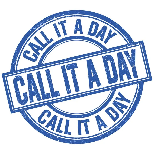 stock image CALL IT A DAY text written word on blue round stamp sign