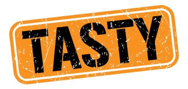 Turuncu-siyah pul üzerine yazılmış lezzetli metin.