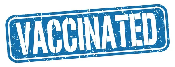 Текст Vaccinated Написаний Синьому Гранжевому Знаку Марки — стокове фото