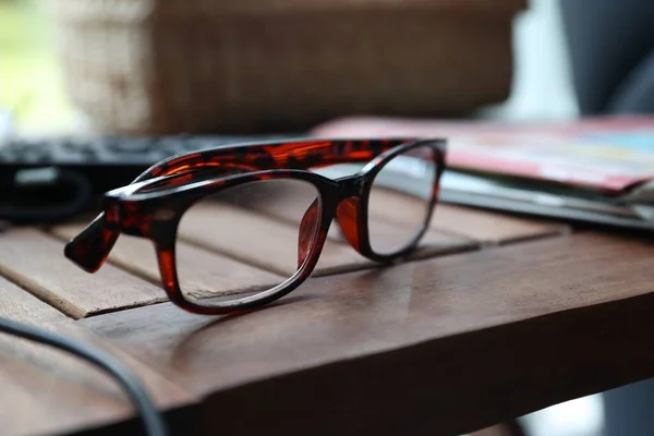 Close Portrait Pair Brown Reading Glasses Lying Wooden Table Next — Stock Photo, Image