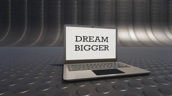 3D modeling of a laptop with DREAM BIGGER  text