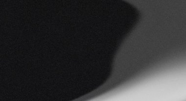 Film tahıl dokusuna sahip soyut siyah ve beyaz gradyan arkaplan, soyut ve dokulu bir zemin oluşturur..