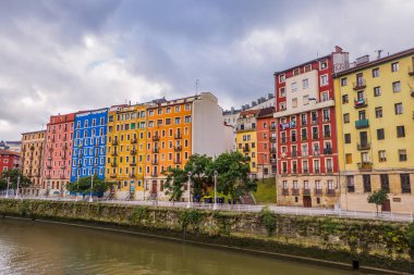 Bilbao, Spain - July 1, 2024 - buidings with Palestinian flags in Casco Viejo clipart