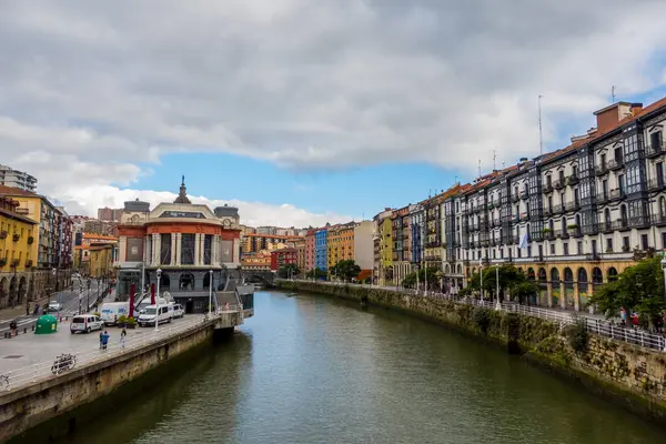 stock image Bilbao, Spain - July 3, 2024 - panoramic view of the Nervion River and Ribera Market