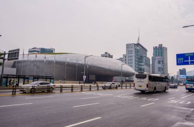 Seoul, Korea - August 26, 2024 - street view of Dongdaemun Design Plaza (DDP) clipart