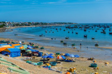 Mui Ne, Vietnam - October 7, 2024 - the fishing village in Mui Ne with boats and pollution clipart