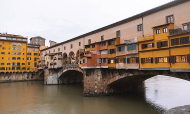 Amazing sunset view of the Old Bridge (Ponte Vecchio in Florence, Italy clipart