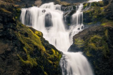 Detail of the upper part of the Rjukandi or Rjukandafoss waterfall in Iceland, shot with telephoto clipart