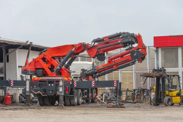 stock image Truck with folded boom for lifting tower, trolley, crane, cement and more