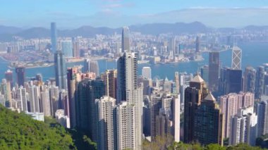 Victoria Tepesi 'nden Hong Kong şehir manzarası muhteşem bir panoramik, modern şehir sabahı sinsi gün bulutları