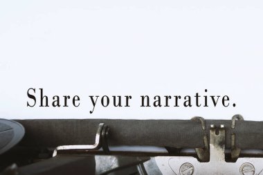Share your narrative text on an old typewriter. Storytelling banner and concept. clipart