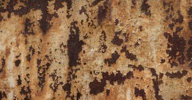 Eski metalin korozyona uğramış görüntüsüyle doku arka planı. Duvar kâğıdı ve tasarım için kullanılabilir                               